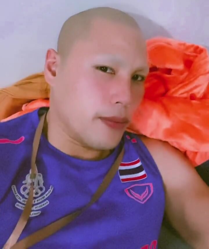 Thai handsome soldier shaves head and eyebrows