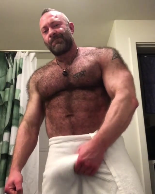 My dad showing me his huge muscles
