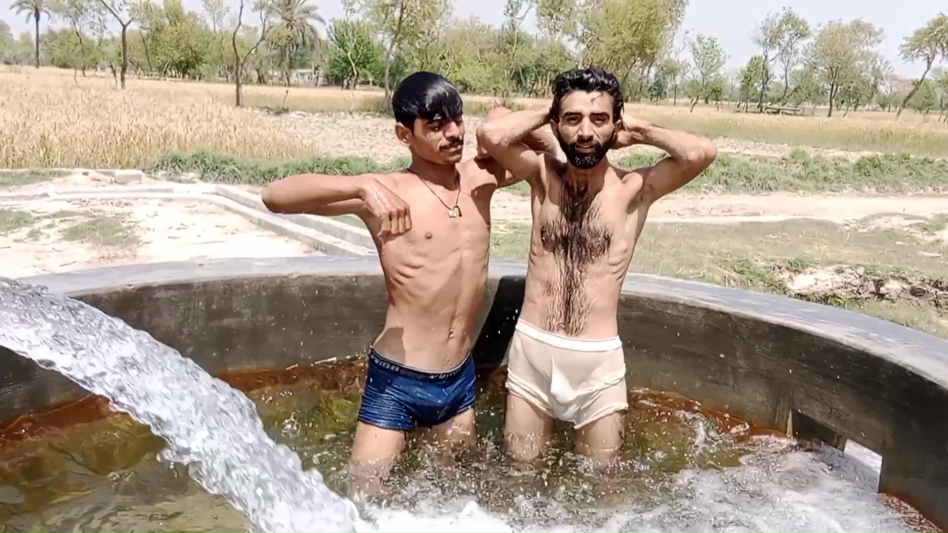 2 paki boys playing in water