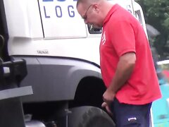 TRUCKER PISSING AND HORNY IN PUBLIC
