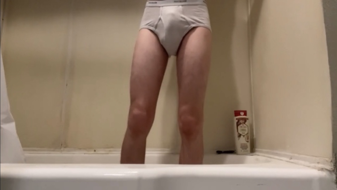 Teen boy wets himself in shower