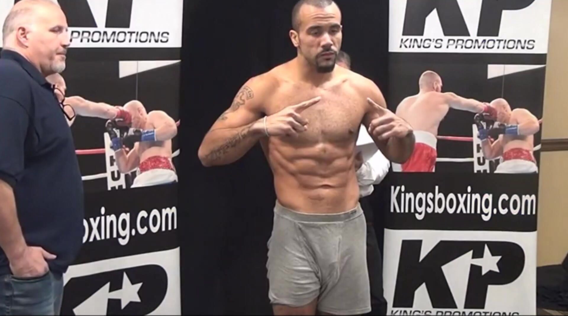 cut cockhead showing in baggy boxers at weigh in