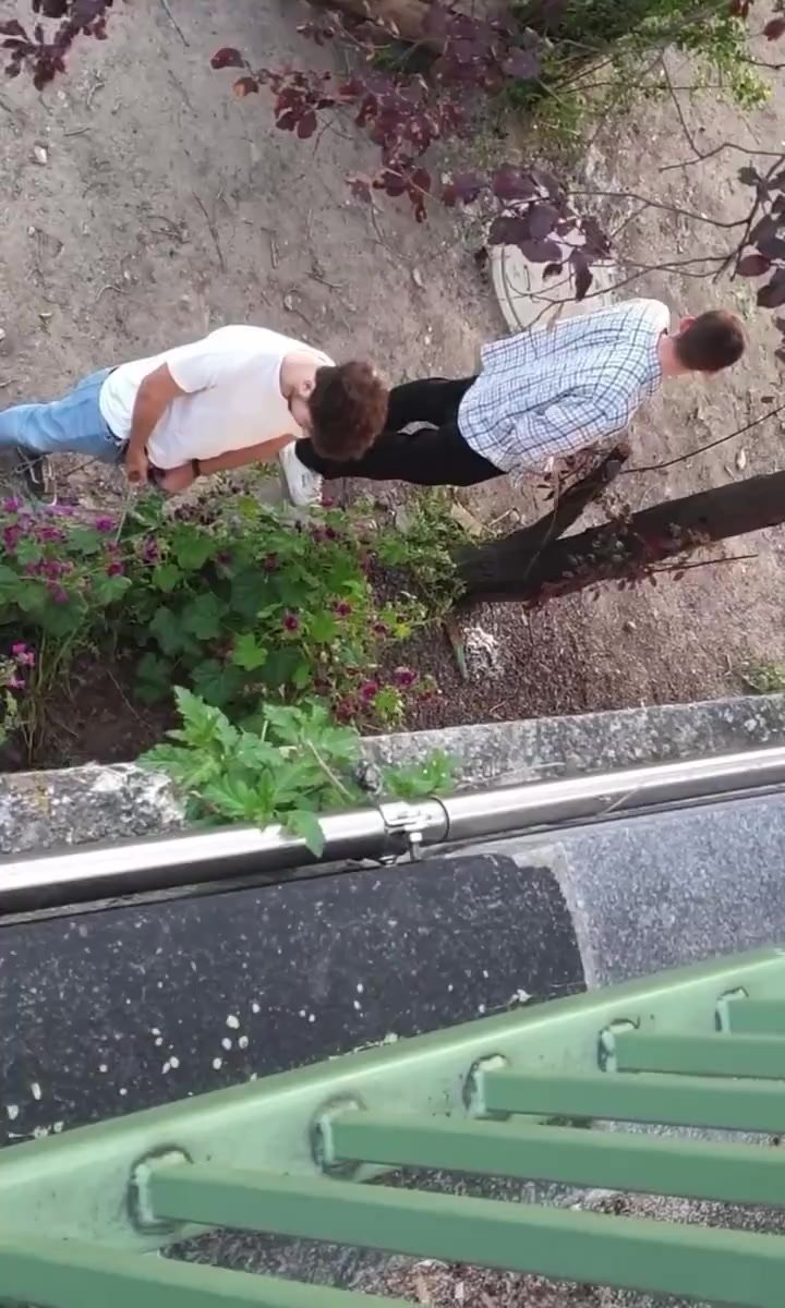Three guys pissing in public