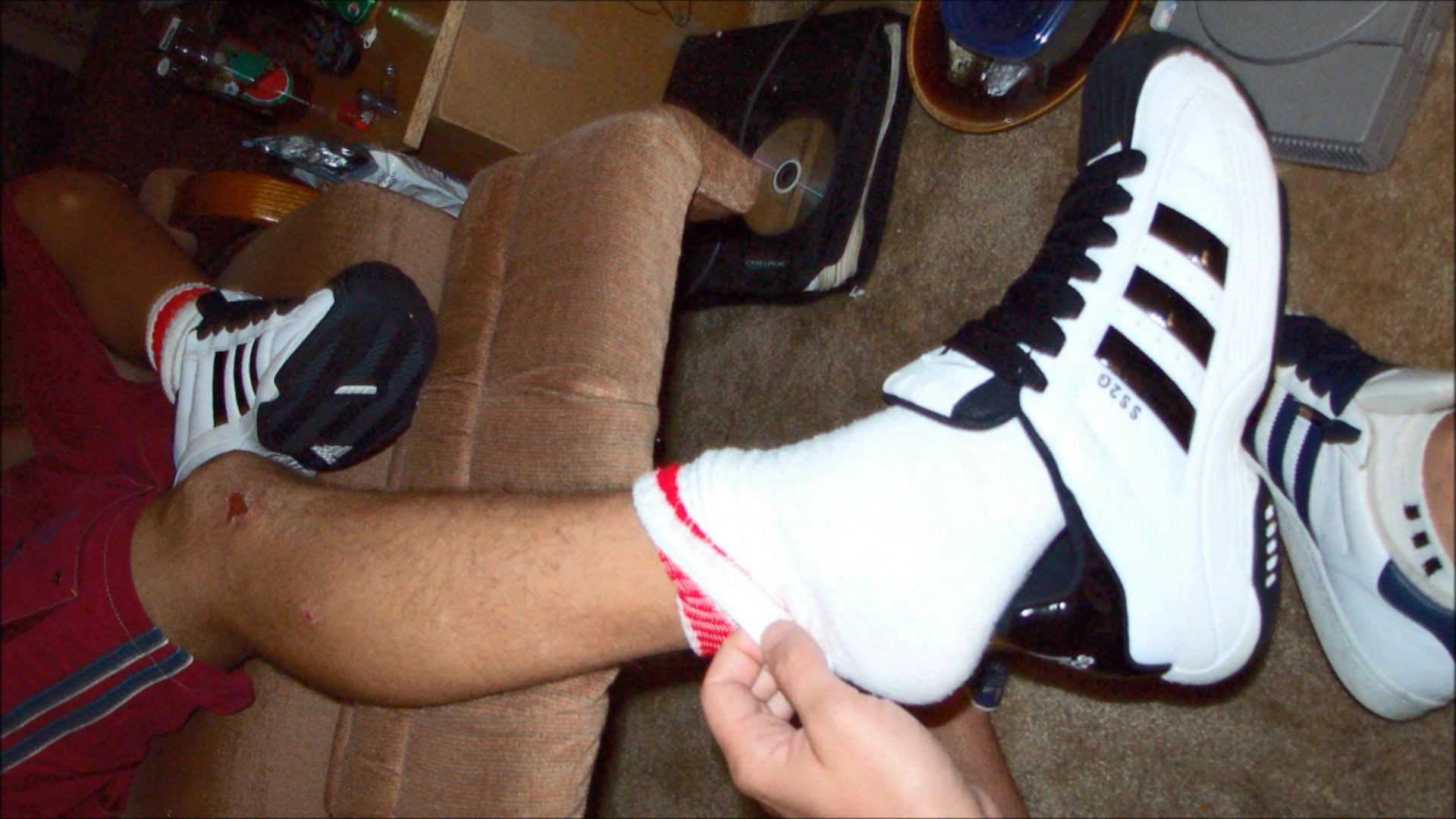 Passed out drunk, Take his adidas superstars & socks