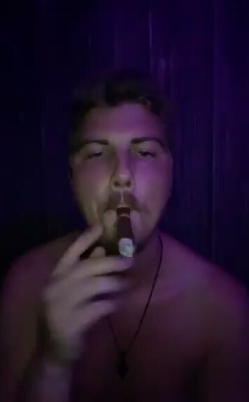 Cigar inhaling lad 2