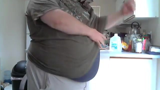 Fat man plays with belly and tits