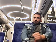 Handsome man cums in public transport