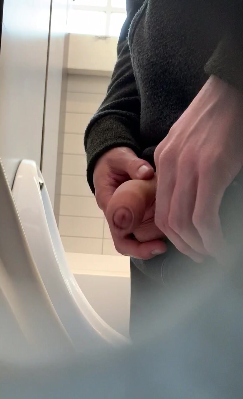 Sexy lad with perfect cock at urinal