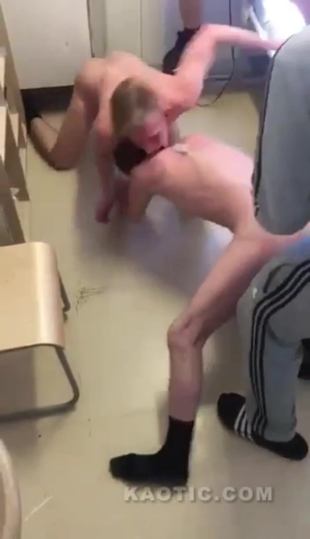 Force "dog fight" prison naked