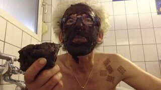 Old German man eats poop after smearing his face..