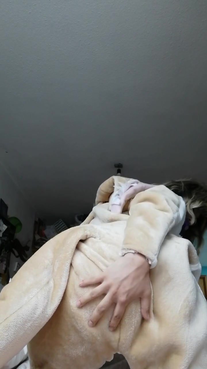 Girl removes her pajama to reveal her diaper