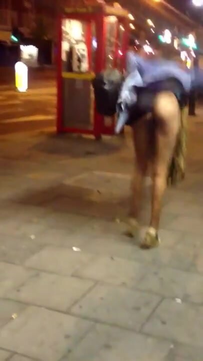 Really drunk woman pee on shop winow