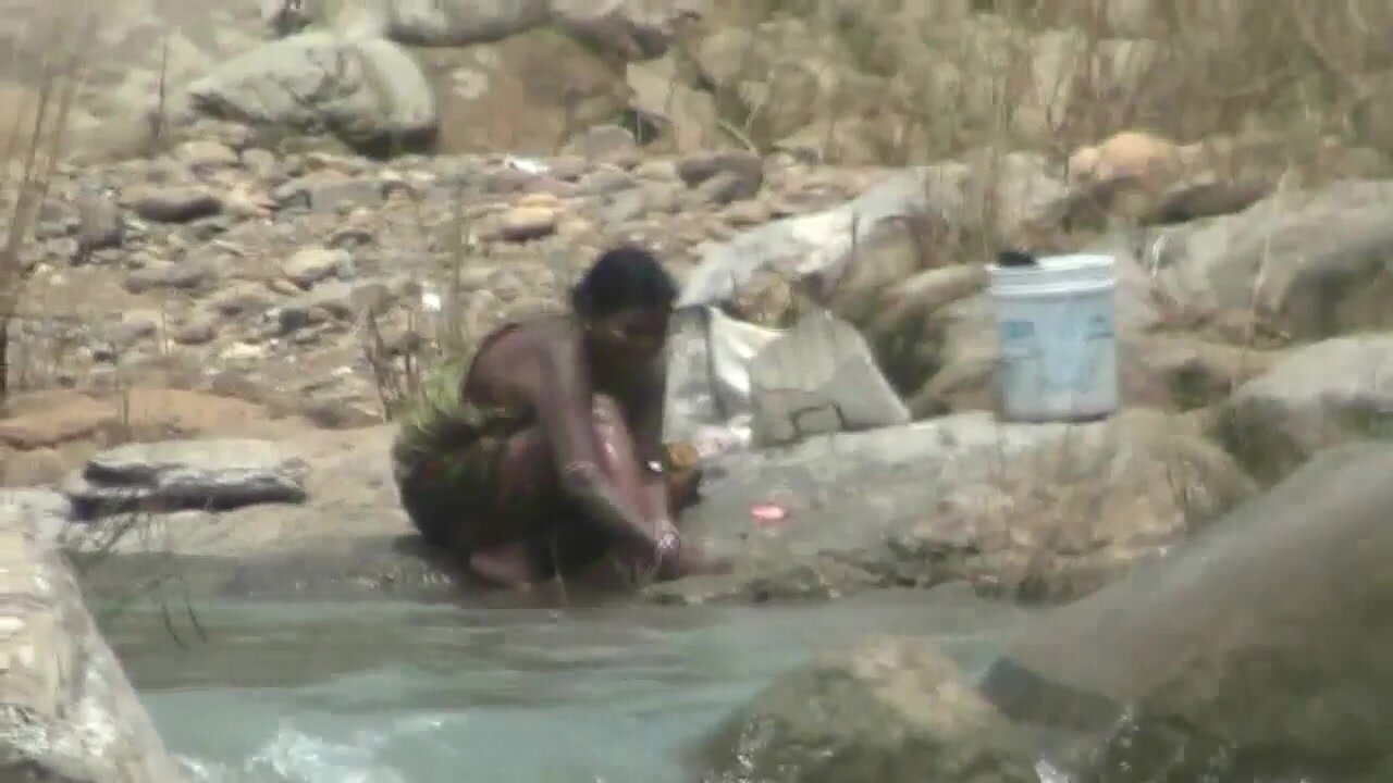 Village woman bathing