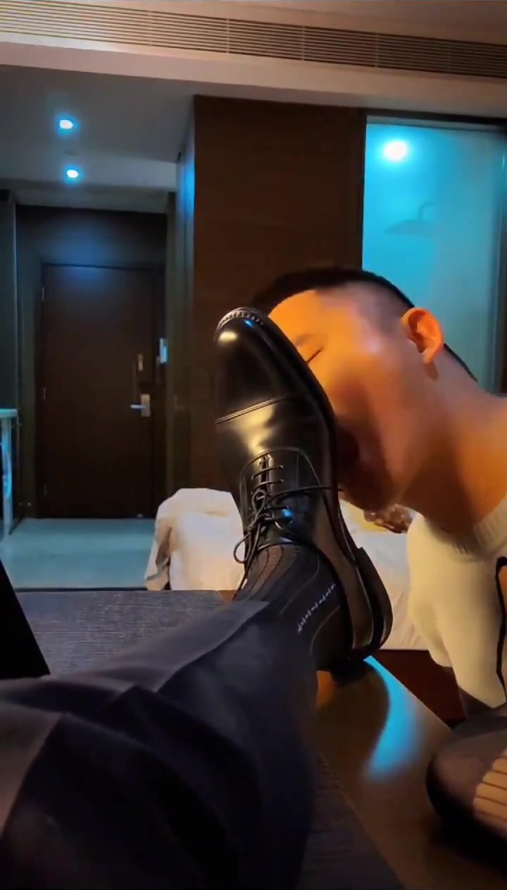 obedient slave licked dominant master's leather shoe