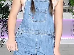Girl in overalls pisses herself during JOI