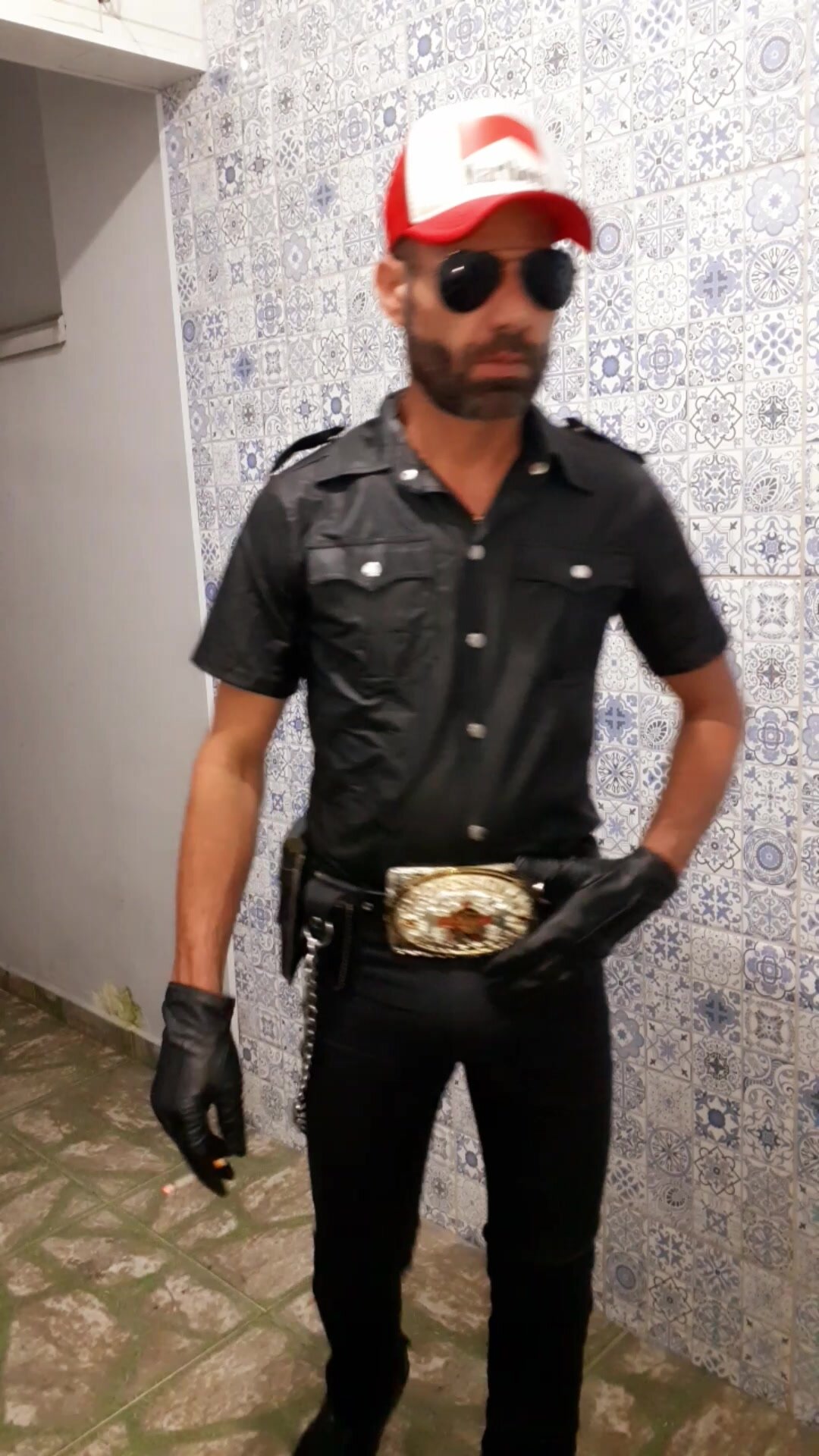 Cowboy with the new leather shirt, smoking