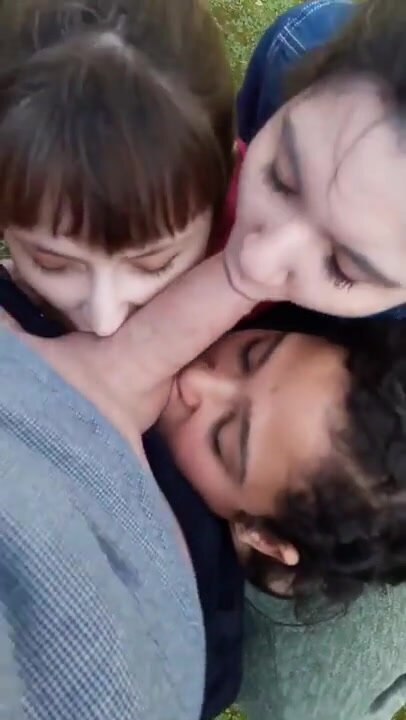 3 girls sharing a cock in public