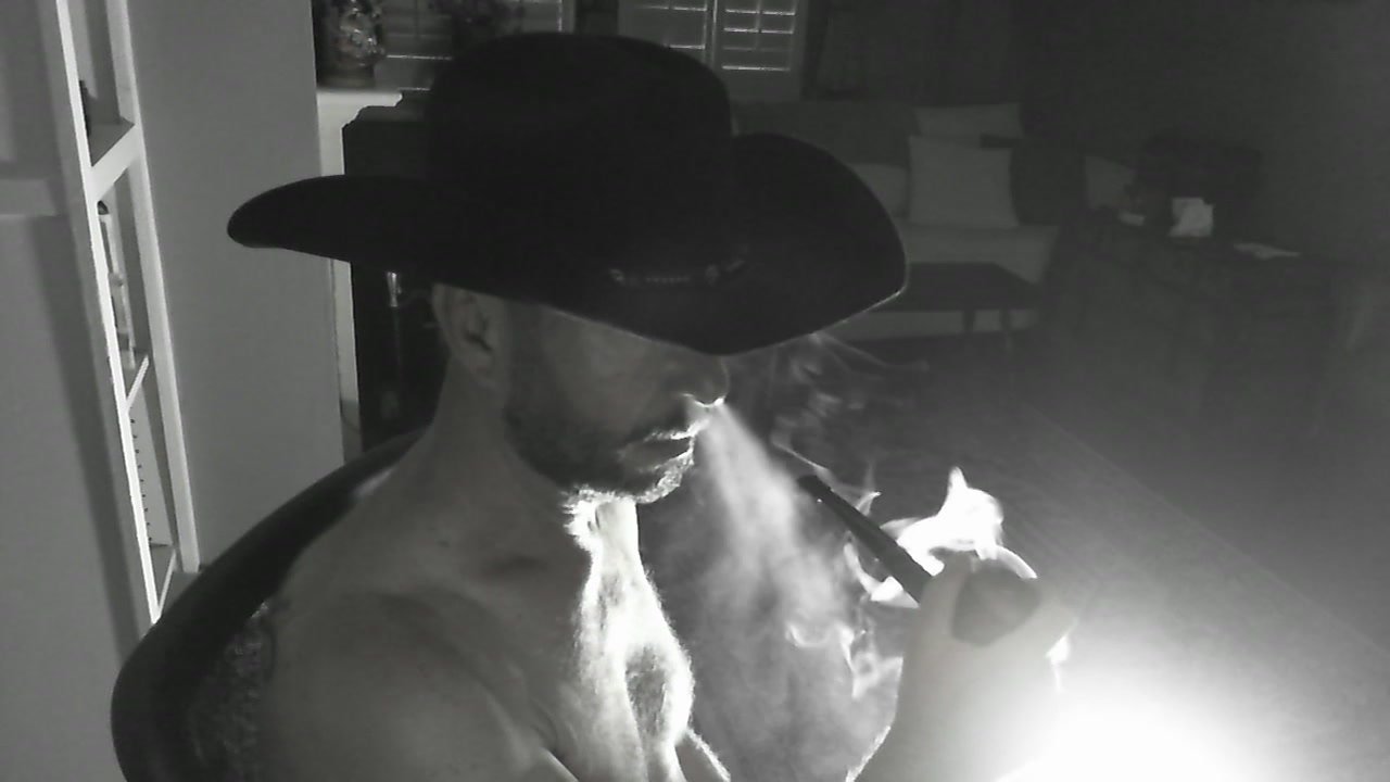 Leather cowboy pipe smoke - video 2