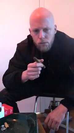 cigar smoking skinhead