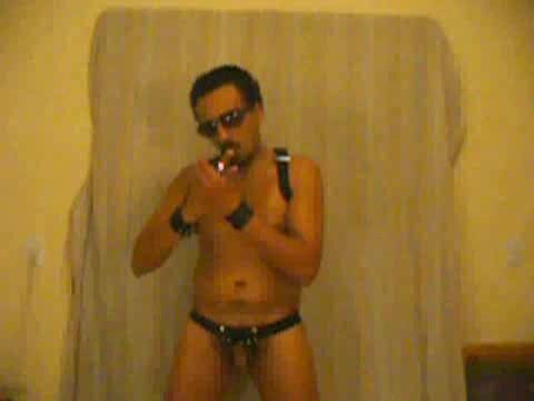 Spanish leather lad smokes cigar and wanks