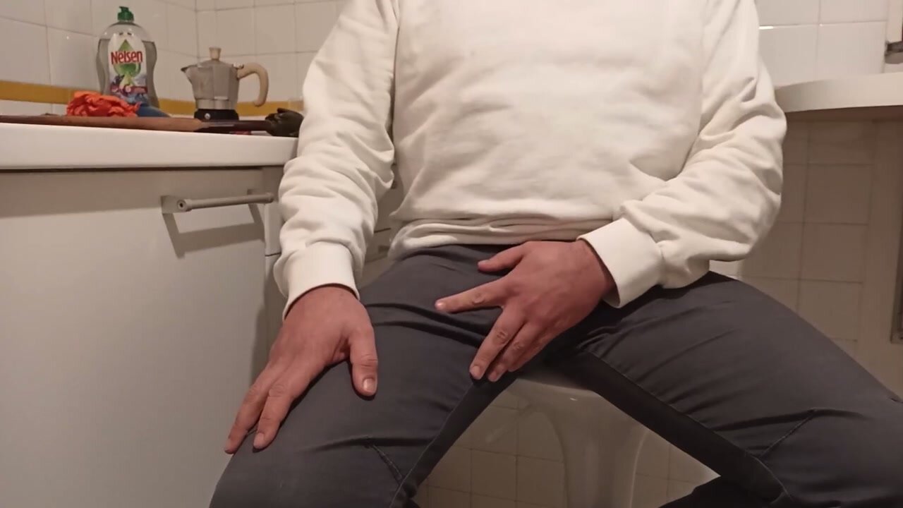 Desperate pee in kitchen