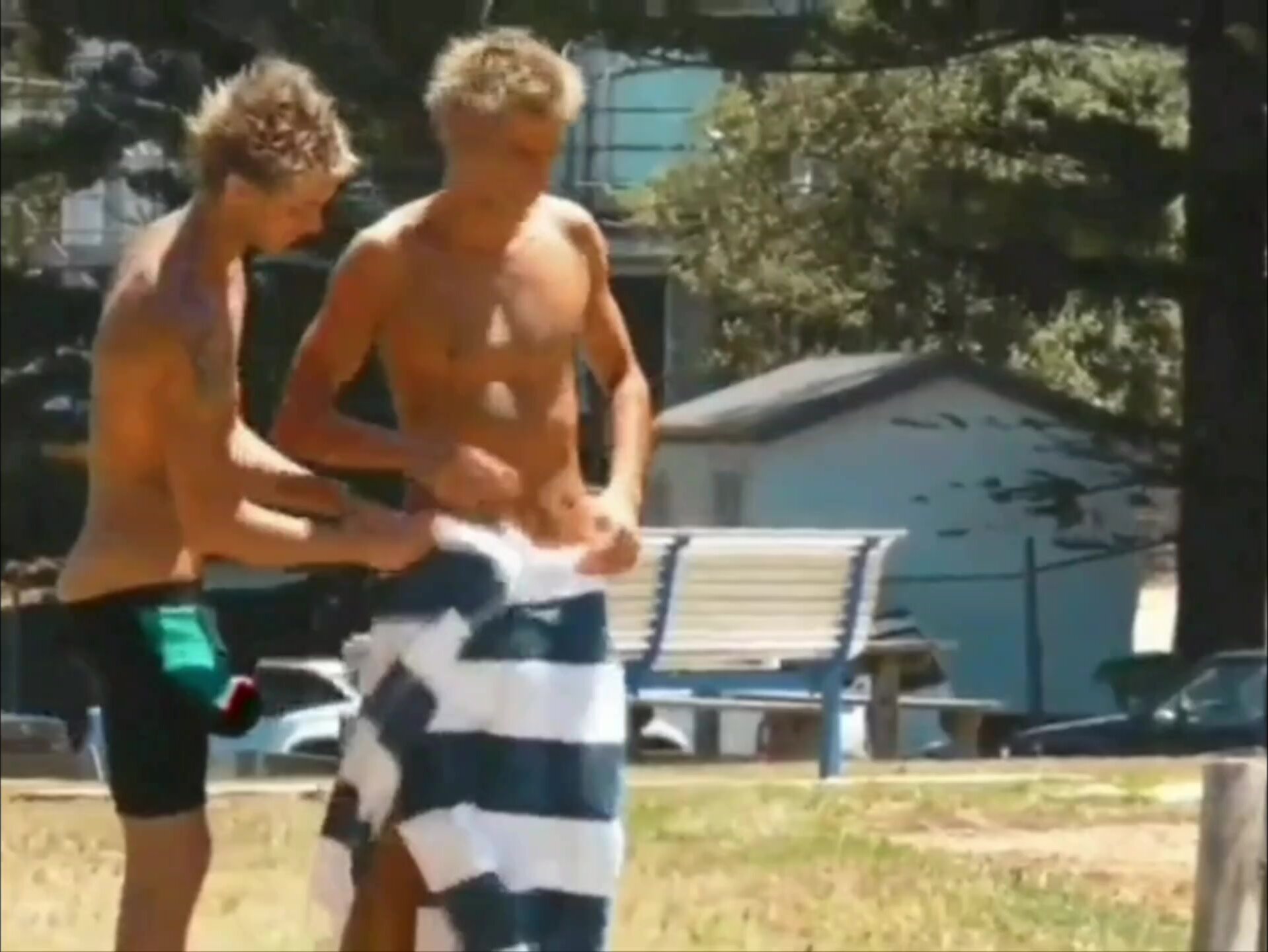 Young blond guy flashing