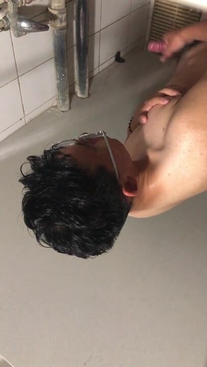 peek at the asian guy jerking in the toilet - video 14