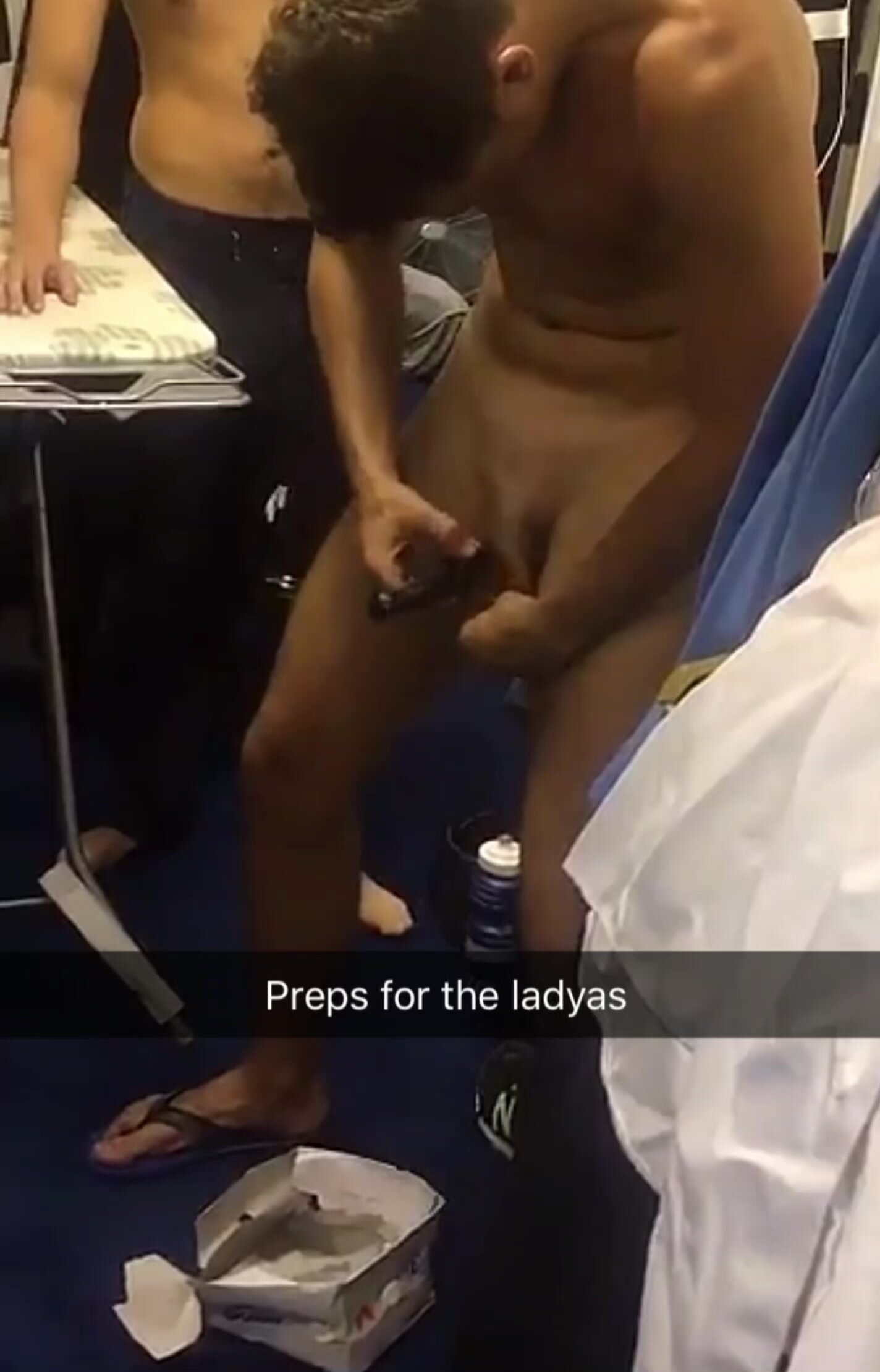 Shaving his pubes in the locker room