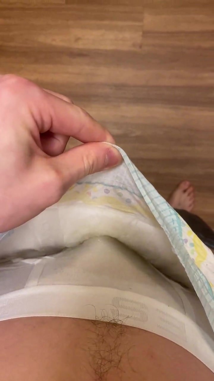 Guy pees underwear and diaper