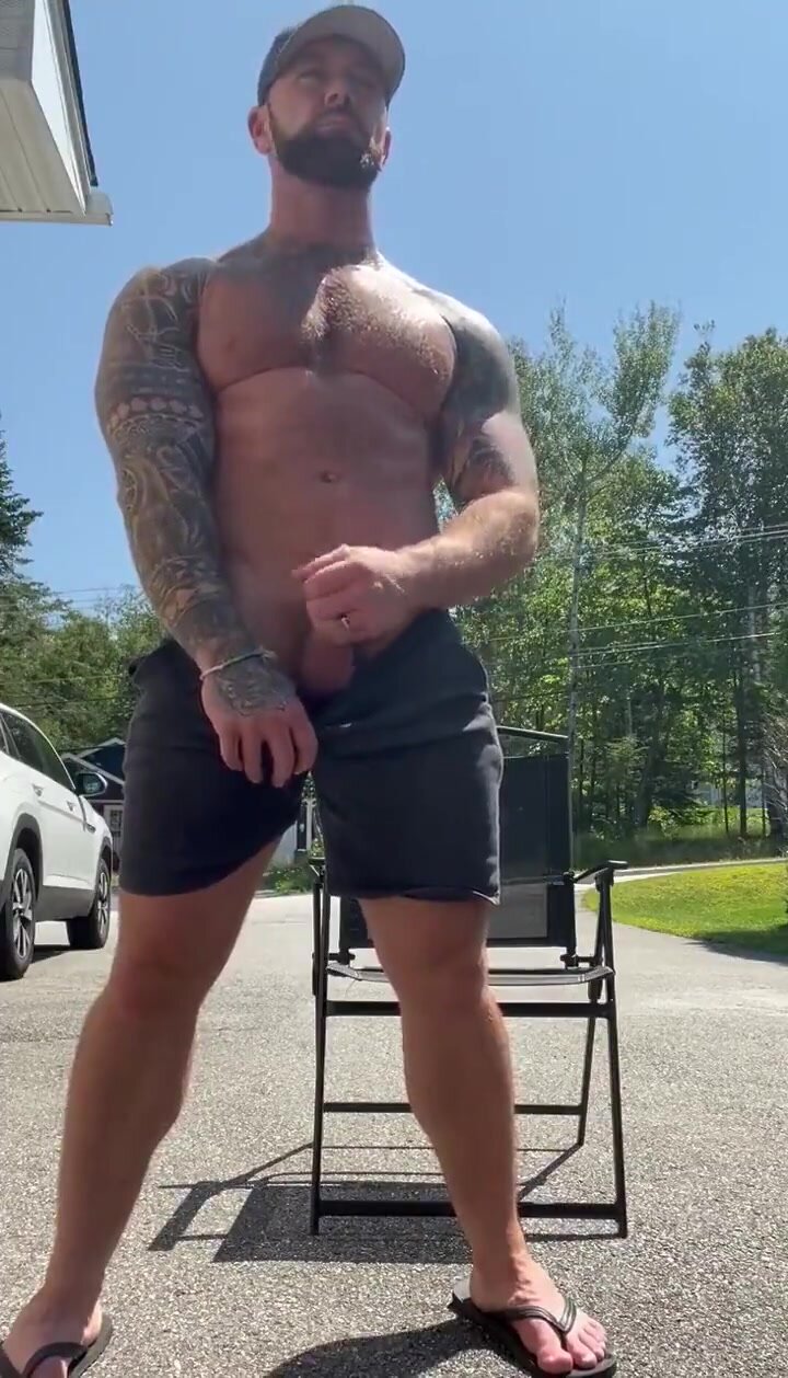 big muscle men peeing outside