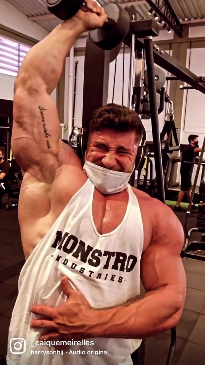 Big Male Bodybuilder Working Out & Flexing