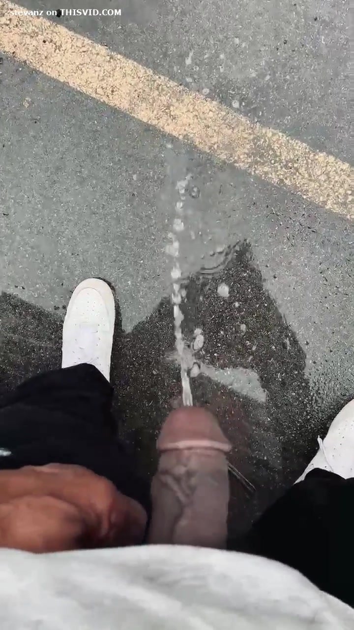 Dudes pissing outside