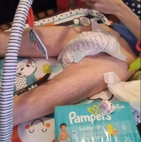 Cum pampers on baby gym play mat