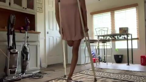 RAK Amputee in Pantyhose + dress crutching