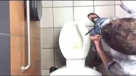 Horny guy caught jerking off in public toilets - video 3