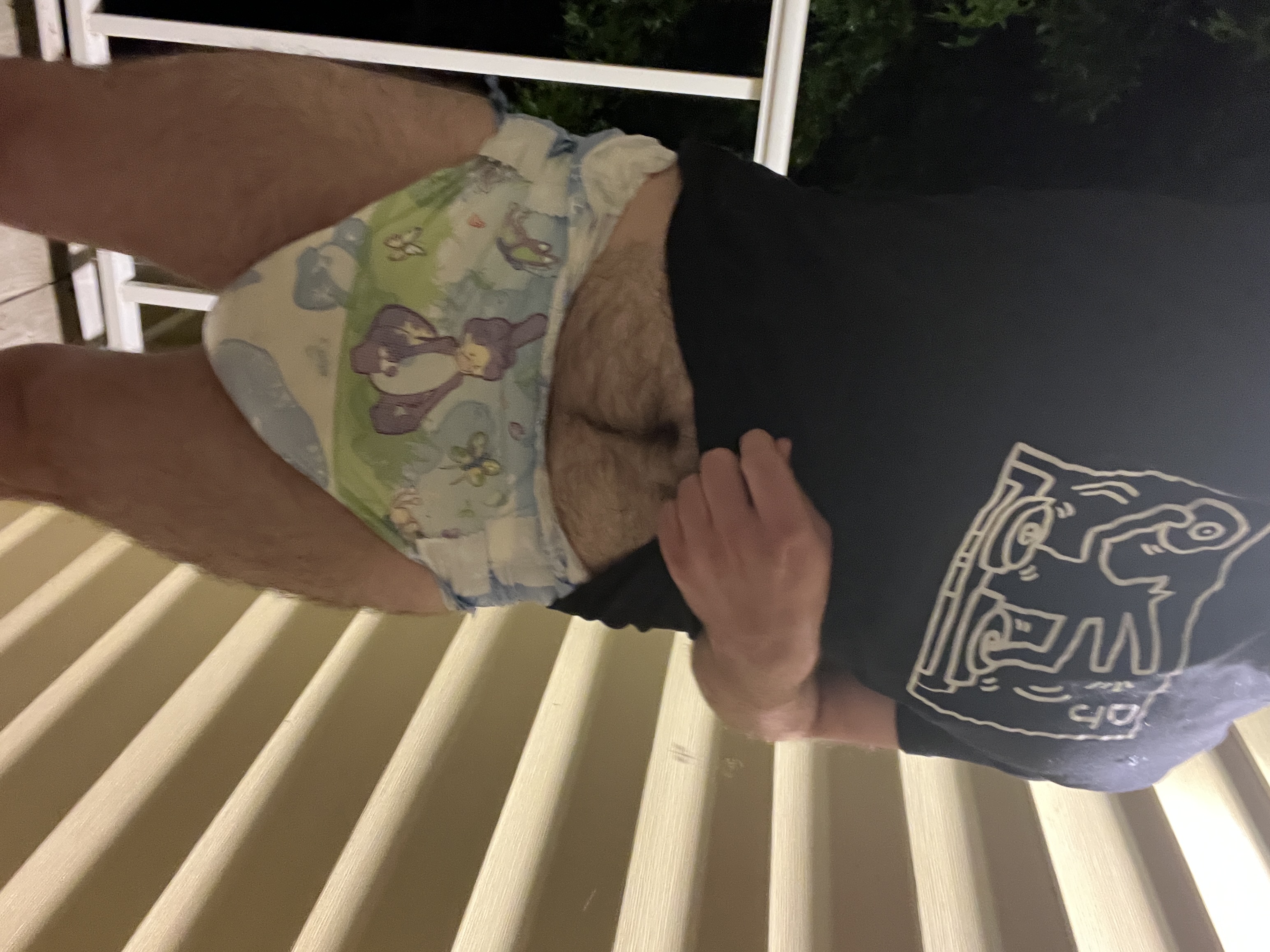 Wearing  diaper on stairs outside
