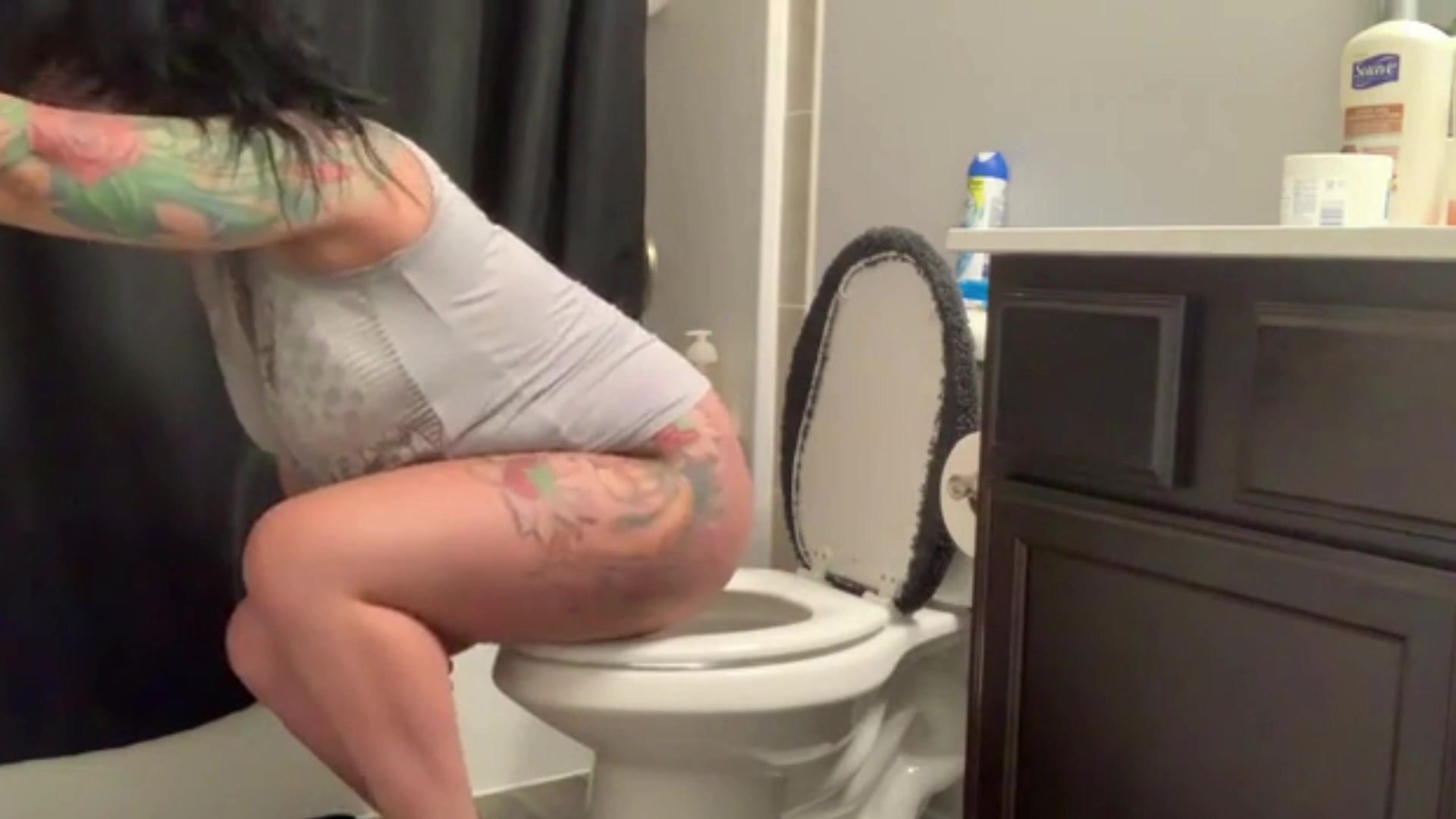 Woman toilet pooping