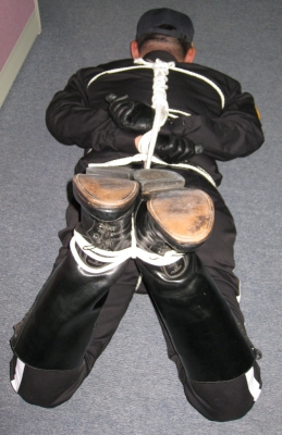 Cop in boots hogtied