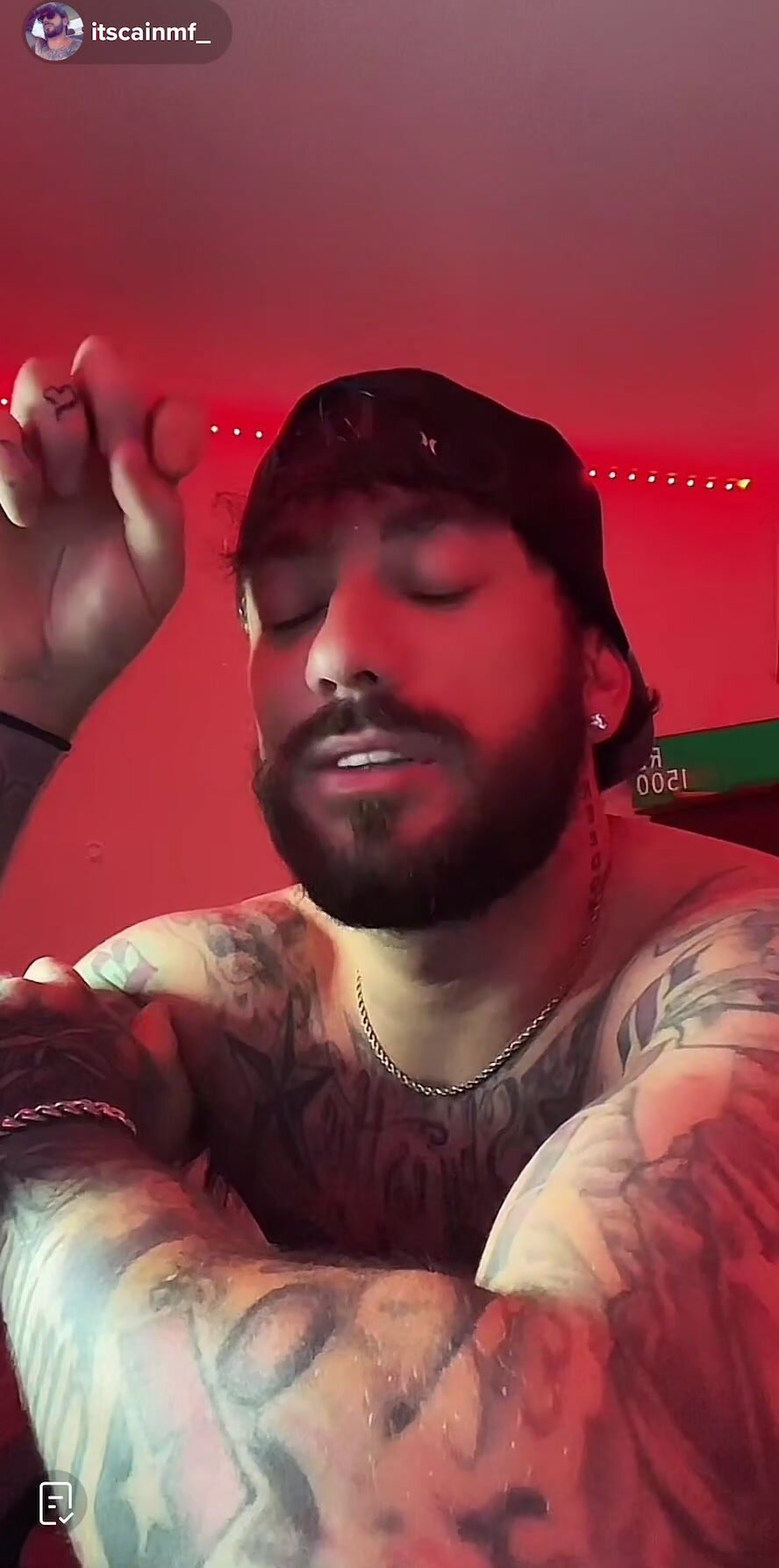 "showing his tattoos" on live