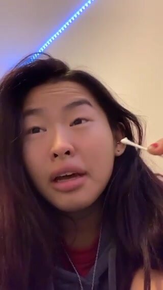 Girl tries to sneeze with eyes open