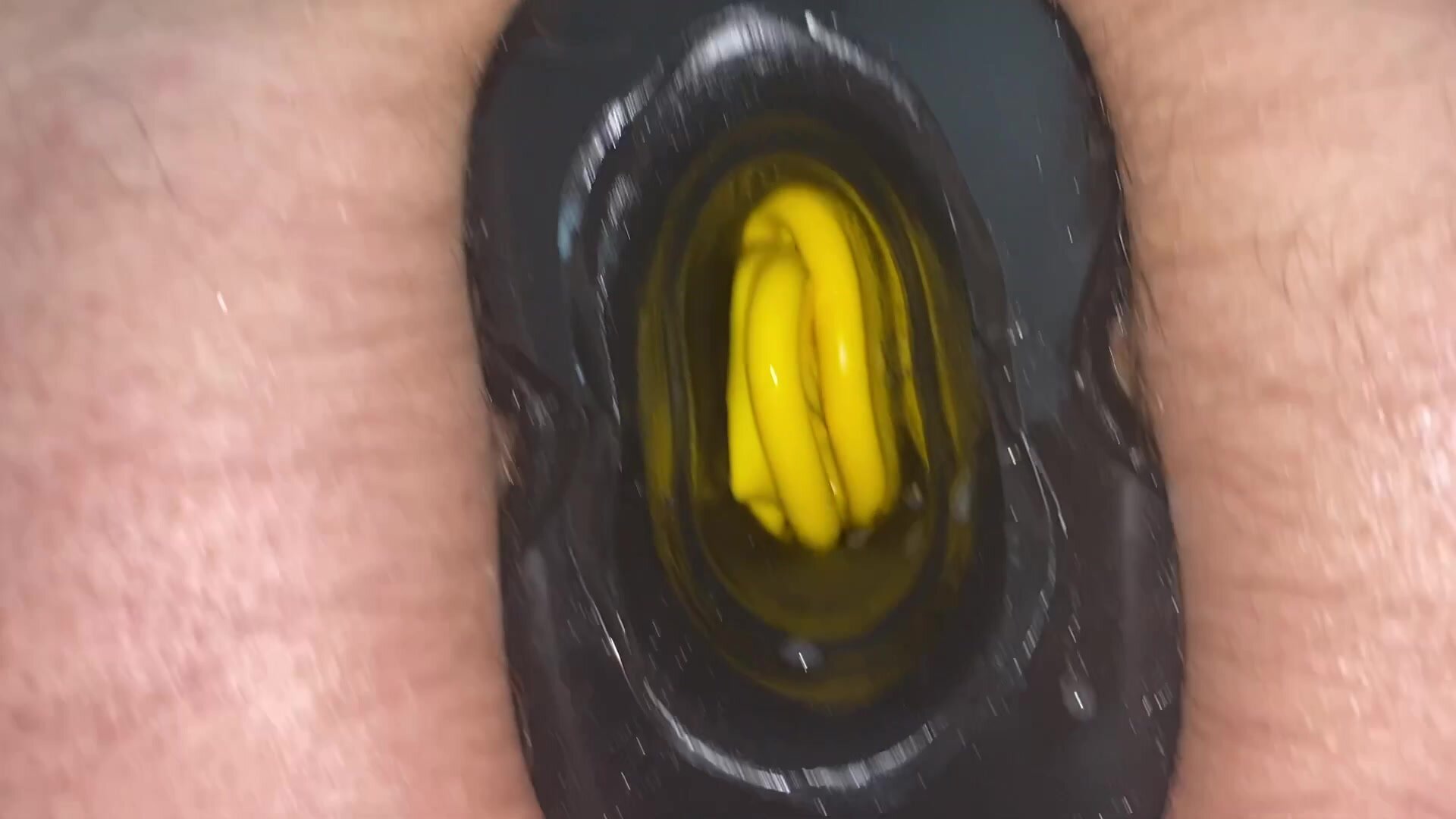 Pighole with yellow Rubber Glove in ass