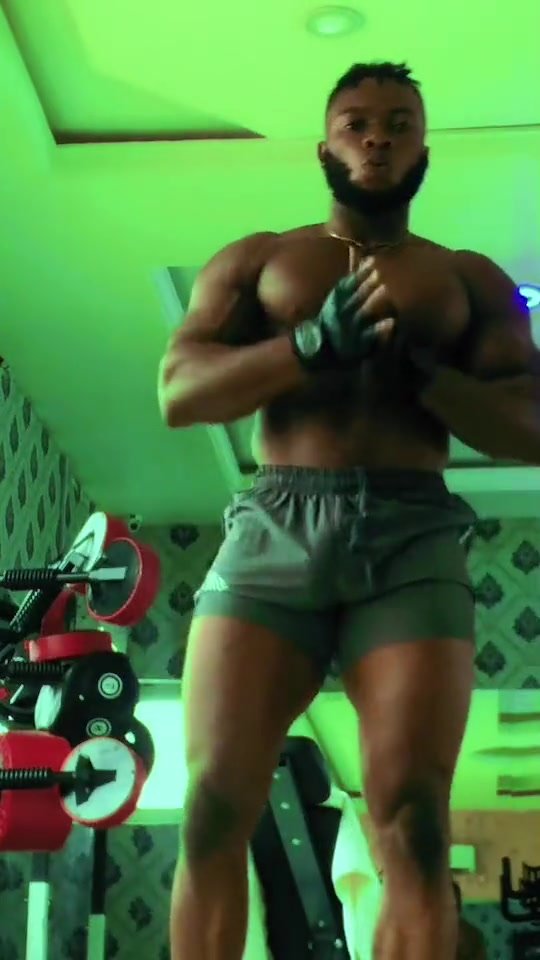Bulging in his gym shorts