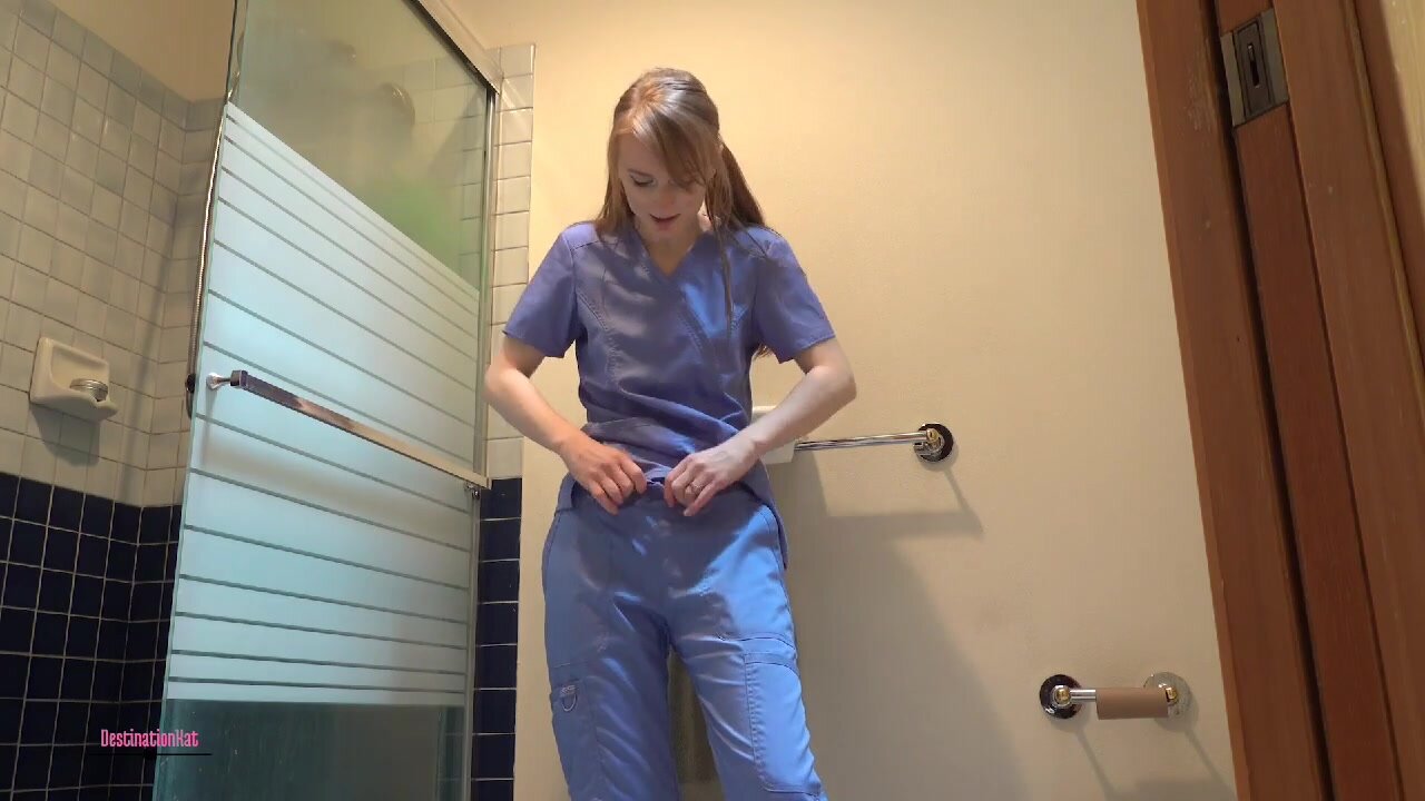 Sexy nurse wetting her pants
