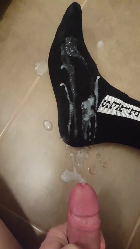 Cumming on some socks