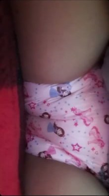 Girl Wets pink diaper