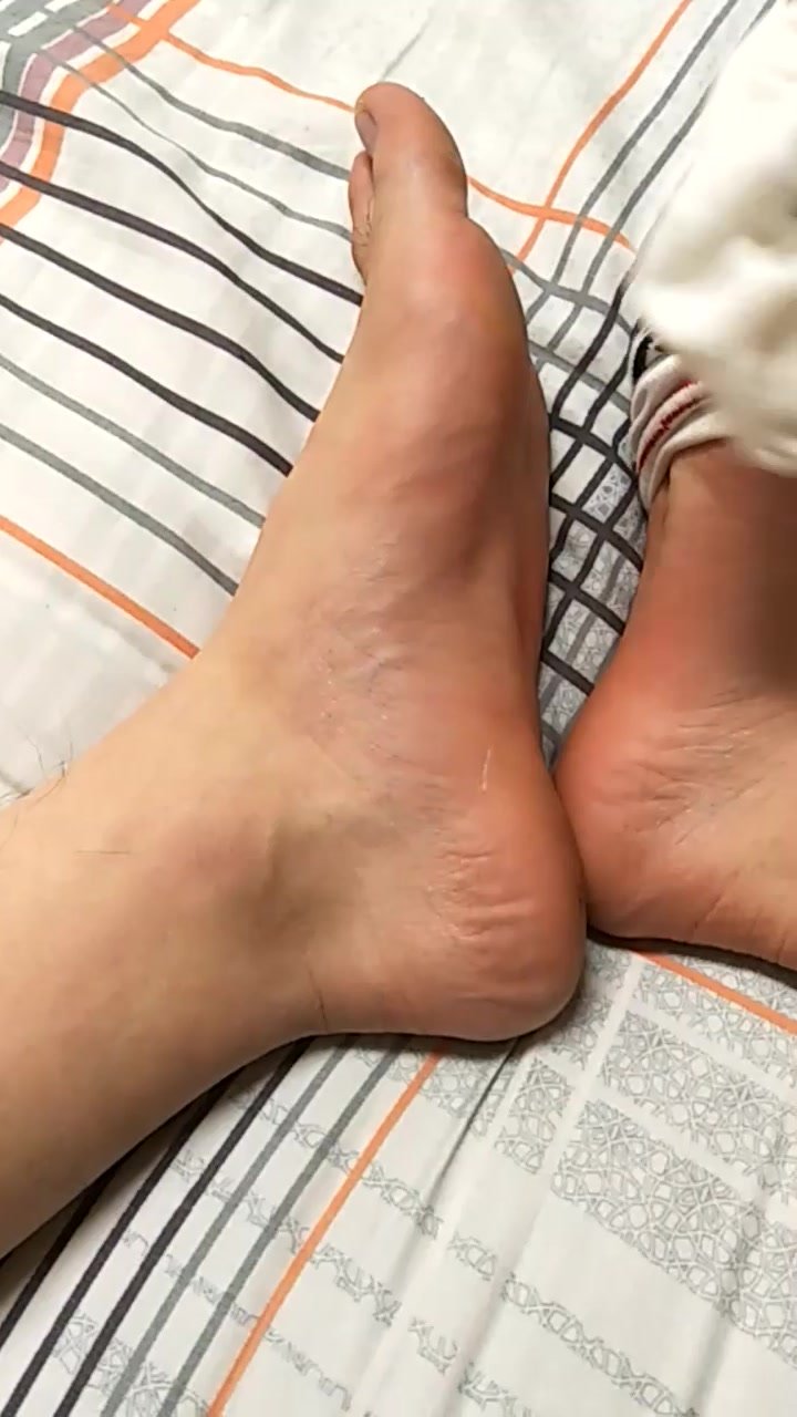 Young Asian stinky socks and barefeet