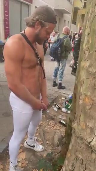 Straight male pissing in public