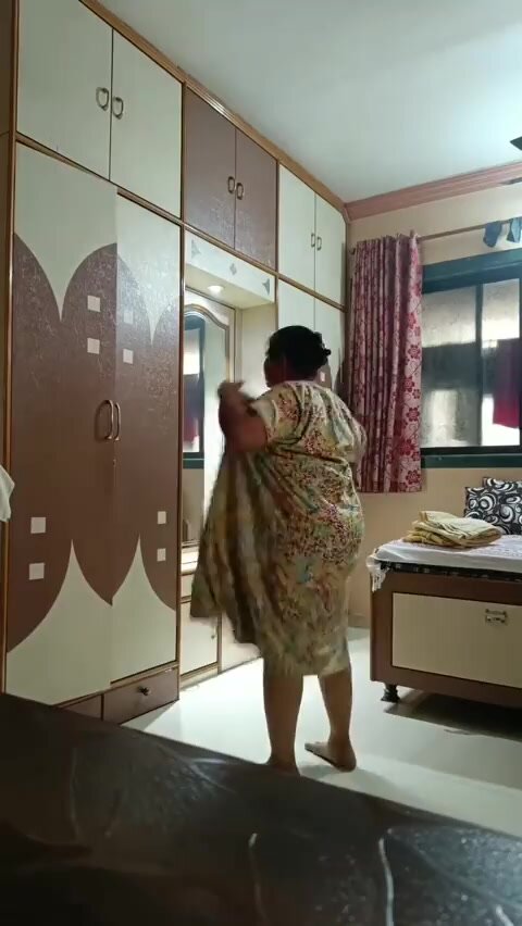 Desi aunty hidden dress change - video 2