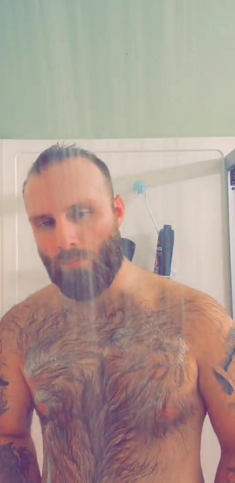 Gorgeous hairy guy in shower