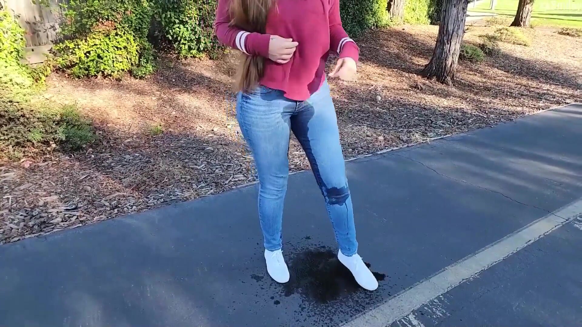 Hot chick pees jeans walking